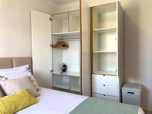 En eller flere senge i et værelse på Apartamento SN Orlando Dantas