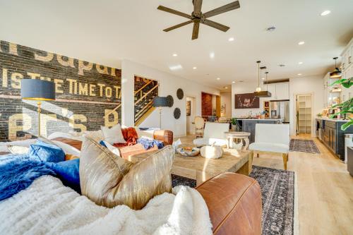 a living room with a couch and a table at 1 Block to Lake City Marina Condo with Rooftop Deck in Lake City