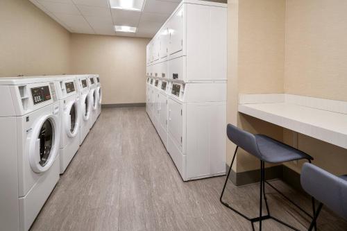 a laundry room with a washer and dryer at Residence Inn Walnut Creek in Walnut Creek