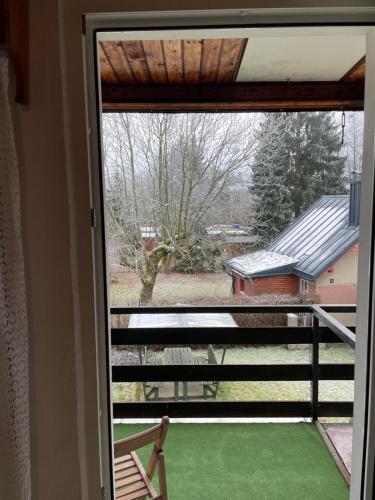 a window with a view of a yard at Privat Medo in Děpoltovice