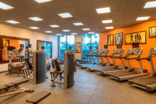 a gym with a bunch of treadmills and machines at Residence Inn by Marriott Los Angeles LAX/Century Boulevard in Los Angeles