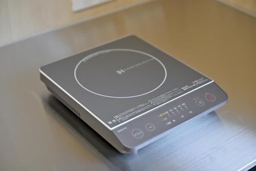 a dvd player sitting on top of a table at わとなみ in Tonosho