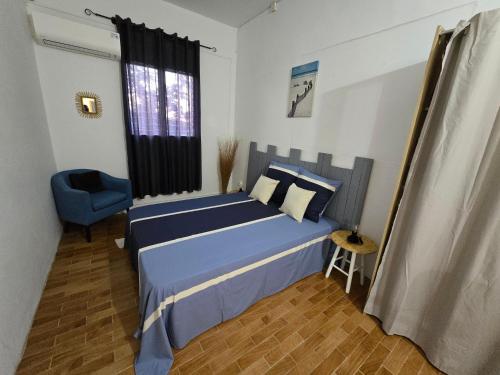 Postel nebo postele na pokoji v ubytování La Maison du Bonheur