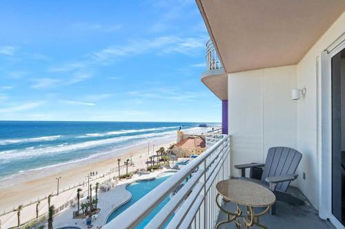 a balcony with a view of the beach and ocean at Luxury 8th Floor 2 BR Condo Direct Oceanfront Wyndham Ocean Walk Resort Daytona Beach | 801 in Daytona Beach