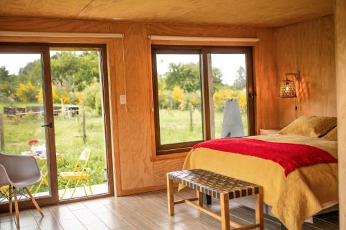 Postel nebo postele na pokoji v ubytování Casa Rayen