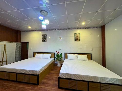 Ένα ή περισσότερα κρεβάτια σε δωμάτιο στο HOTEL Cù Lao 4 Tây Ninh