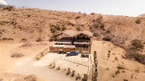 an aerial view of a building in the desert at La Vidita 891 - Piscinas, Lobitos in Lobitos