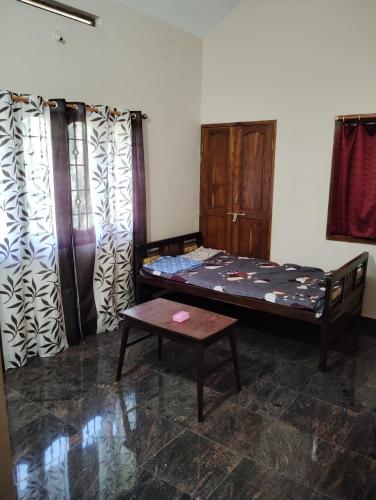 Katil atau katil-katil dalam bilik di Kogre Homestay
