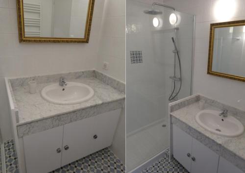 a bathroom with two sinks and a shower at Le Mazet Du Domaine in Gordes