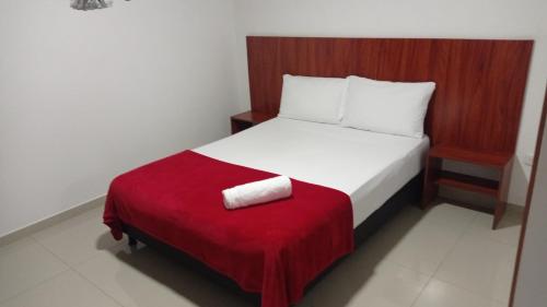 Postel nebo postele na pokoji v ubytování Hotel el cable pereira