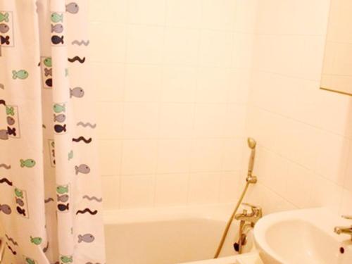 Koupelna v ubytování Appartement 6 pers, Wi-Fi, proche pistes ski, garage privé, vue lac et montagnes - FR-1-814-24