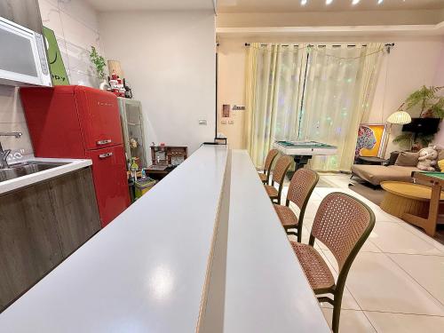 Una cocina o kitchenette en SKYPIEA Villa 空島民宿 宜蘭包棟民宿l電動麻將l烤肉BBQl聚會