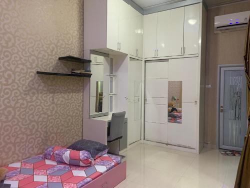 Postel nebo postele na pokoji v ubytování Zahran Guest House