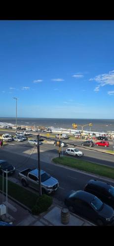 a view of a parking lot with cars parked at Dpto Unzue in Mar del Plata