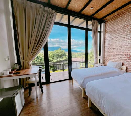 Katil atau katil-katil dalam bilik di Krin Resort