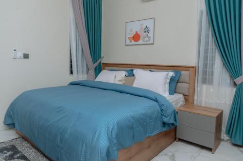 Ένα ή περισσότερα κρεβάτια σε δωμάτιο στο Elite Stay North Legon