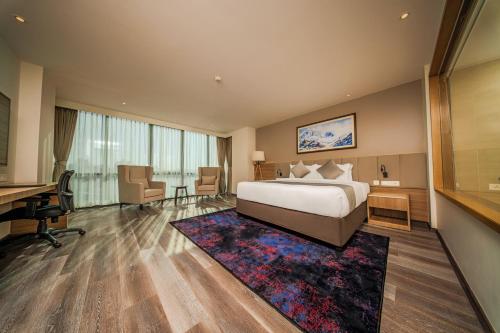 Ένα ή περισσότερα κρεβάτια σε δωμάτιο στο Best Western Plus Kathmandu Hotel
