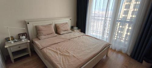 En eller flere senge i et værelse på Tidewhisper Deluxe Suite 2 -2 Bedrooms, 2 Bathrooms