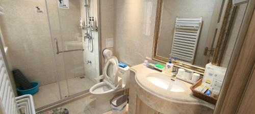 Et badeværelse på Tidewhisper Deluxe Suite 2 -2 Bedrooms, 2 Bathrooms