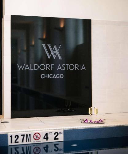a sign for the waldorf astoria chicago at Waldorf Astoria Chicago in Chicago