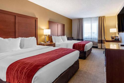 En eller flere senge i et værelse på Comfort Inn Great Falls South