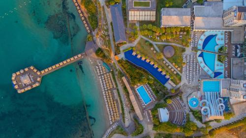 an aerial view of a resort next to the ocean at LAUR HOTELS Experience & Elegance in Didim