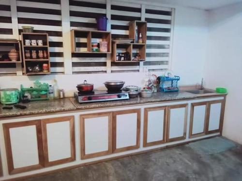 Η κουζίνα ή μικρή κουζίνα στο Mermaids Villas