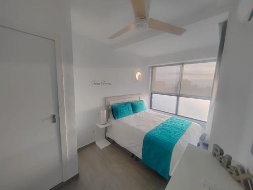 Llit o llits en una habitació de Aloha Playa 1217