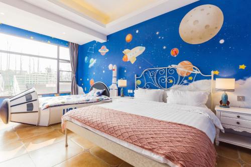 Katil atau katil-katil dalam bilik di Hanju Guesthouse - Near Disney Park