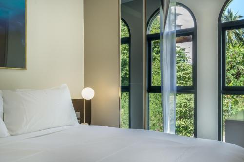 Katil atau katil-katil dalam bilik di Palmetto Park Residence