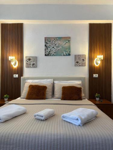Ένα ή περισσότερα κρεβάτια σε δωμάτιο στο Kingsland Apartment Ksamil
