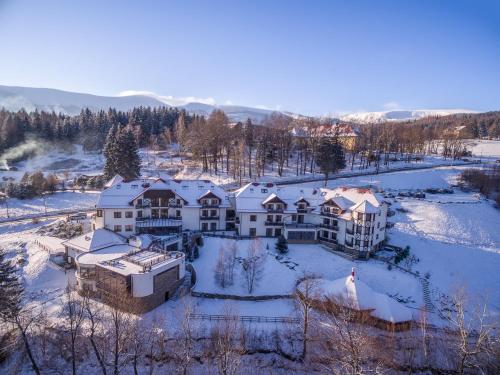an aerial view of a house in the snow at Hotel Dziki Potok Karpacz Konferencje & SPA in Karpacz