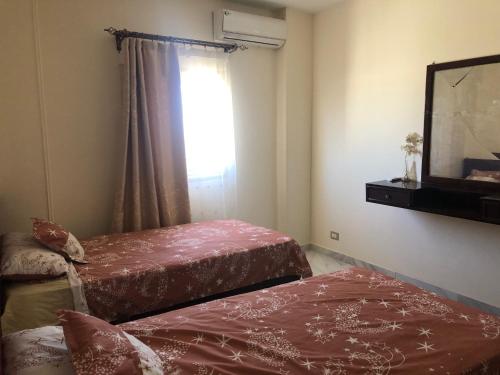 Ένα ή περισσότερα κρεβάτια σε δωμάτιο στο Lady Queen Apartment