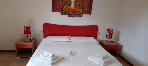 Postel nebo postele na pokoji v ubytování Villasulizzu