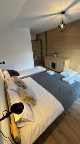 Una cama o camas en una habitación de A Sziget