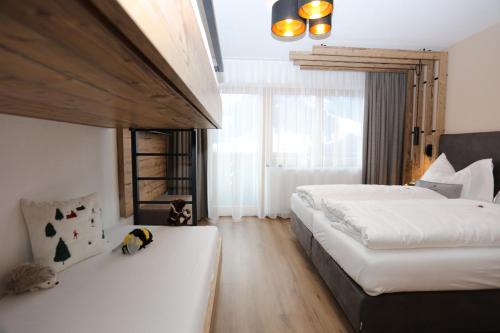 Ένα ή περισσότερα κρεβάτια σε δωμάτιο στο Apartmenthaus Sonnenhof