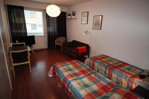 Cama o camas de una habitación en Hotel Aakenus Studio Valta