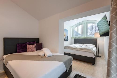 Ένα ή περισσότερα κρεβάτια σε δωμάτιο στο Ferienhaus Au Villa