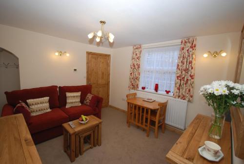 Χώρος καθιστικού στο Saltburn Holidays Bluebell Cottage