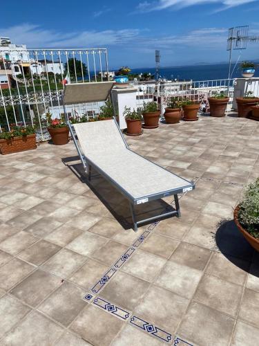 a ping pong table sitting on top of a patio at Casa Pamela in Capri