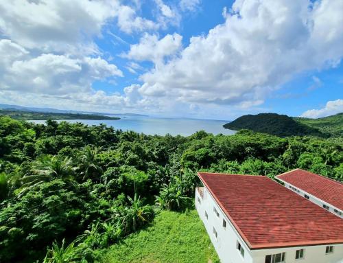 a view of the ocean from a house at Tablas Seaview Homestay in Ferrol