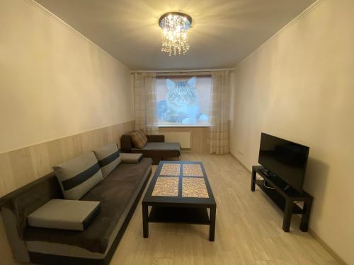 Гостиная зона в Cat Garden Riga Airport Apartments