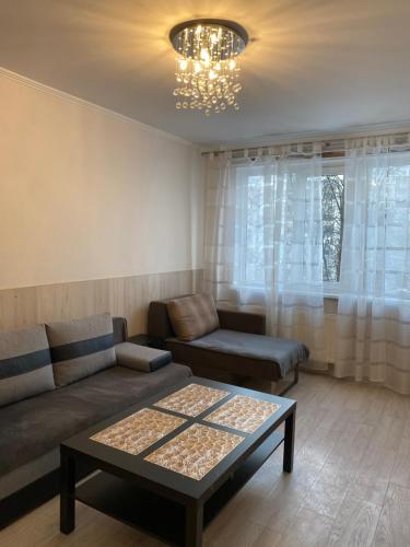 Гостиная зона в Cat Garden Riga Airport Apartments