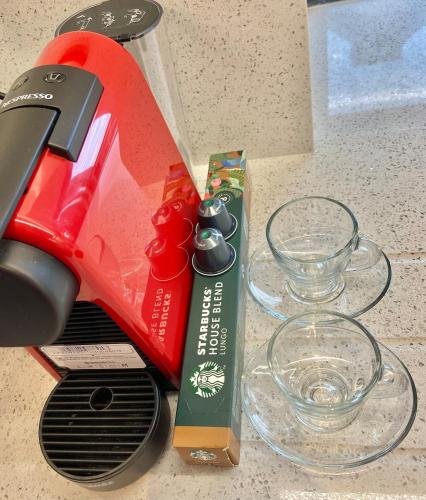 a pair of scissors and a box on a counter at Coastal Gem 10 Mins from Dublin Airport in Donabate