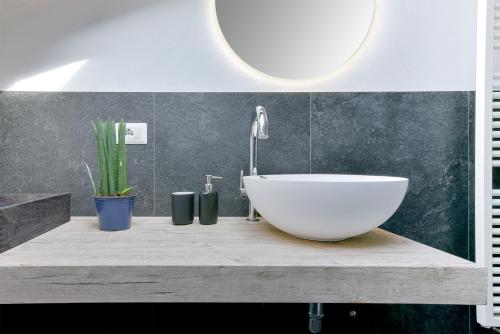 Ένα μπάνιο στο Botanical Apartments Modena