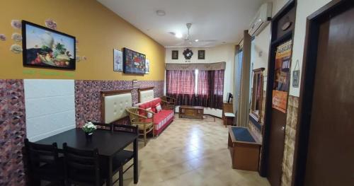 Χώρος καθιστικού στο Hasif Homestay Studio