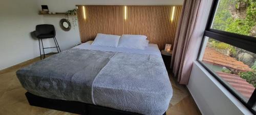 Postel nebo postele na pokoji v ubytování Vila Serena