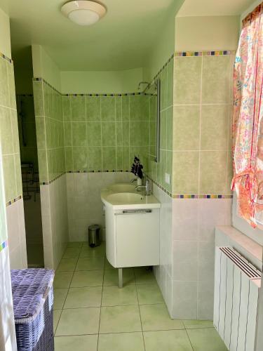 Ένα μπάνιο στο Gîte la Hulotte