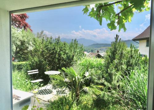 desde la ventana de un jardín en Pilgerwohnung, en Wald