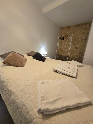 Postel nebo postele na pokoji v ubytování Gîte Les Combes Montignac Lascaux